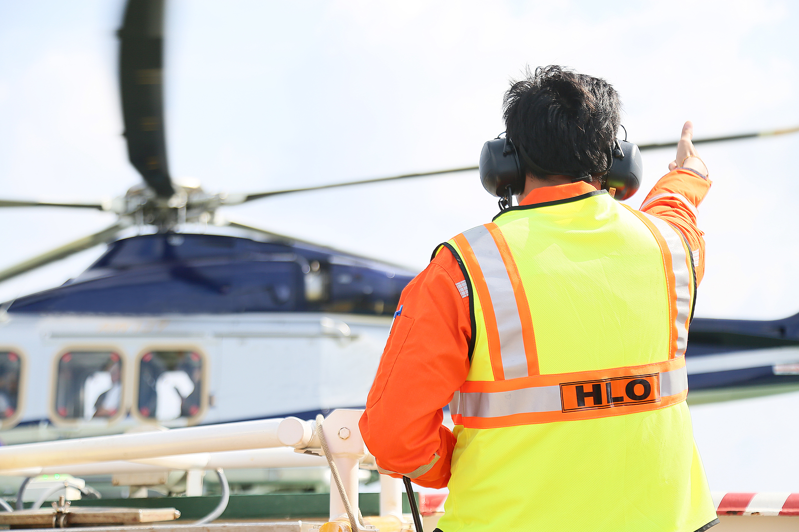 Helicopter landing officer directing operations